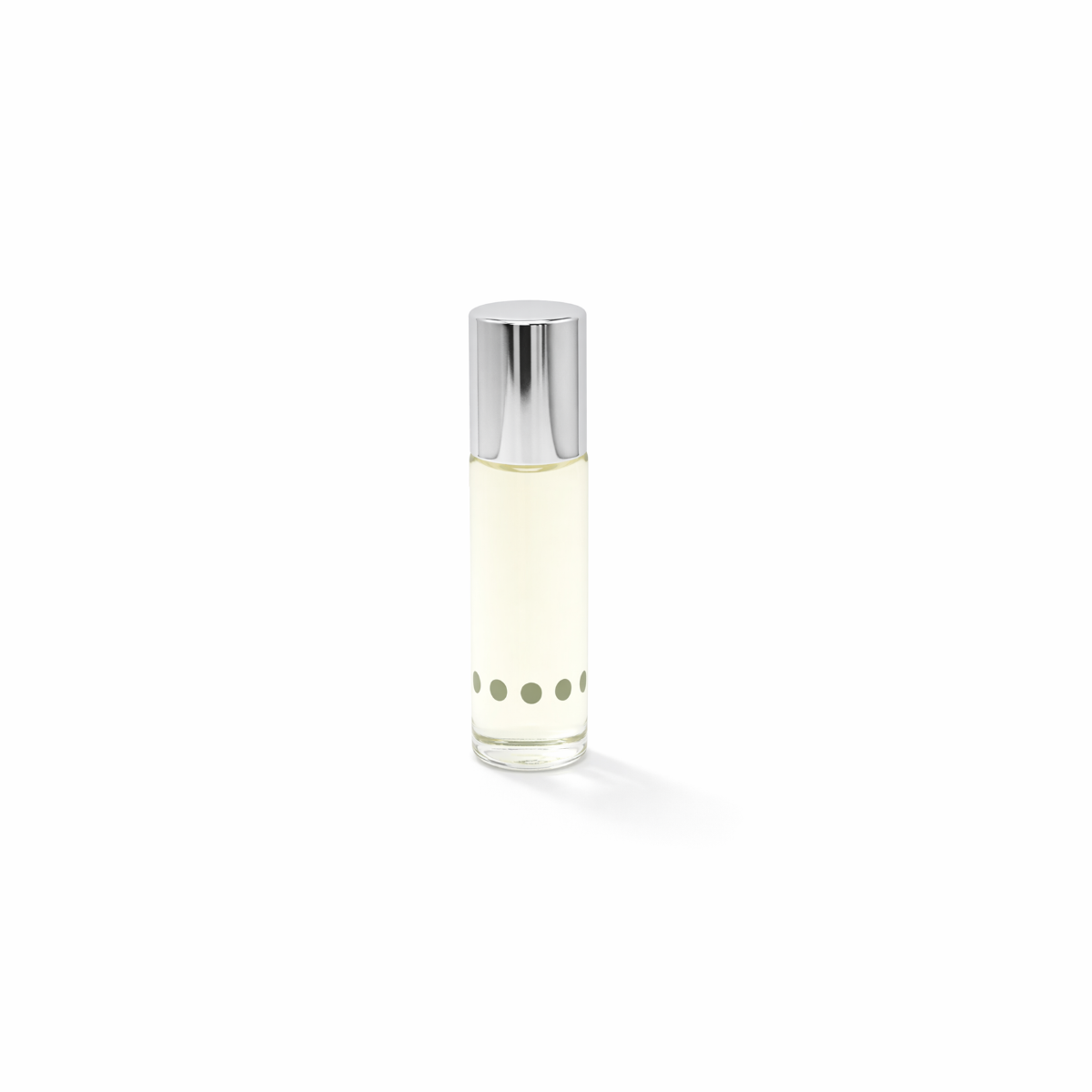 Glass bottle with silver cap and pale yellow fragrance