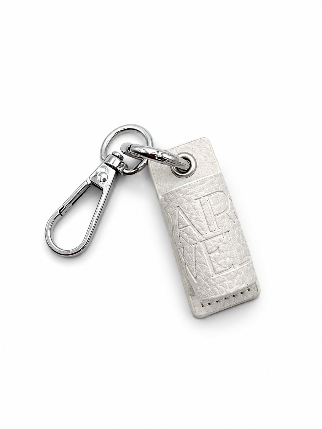 A silver-tone metal keychain featuring a textured rectangular tag with the embossed letters 'AP' and 'ME' separated by a vertical line, attached to a split ring and lobster clasp on a white background.